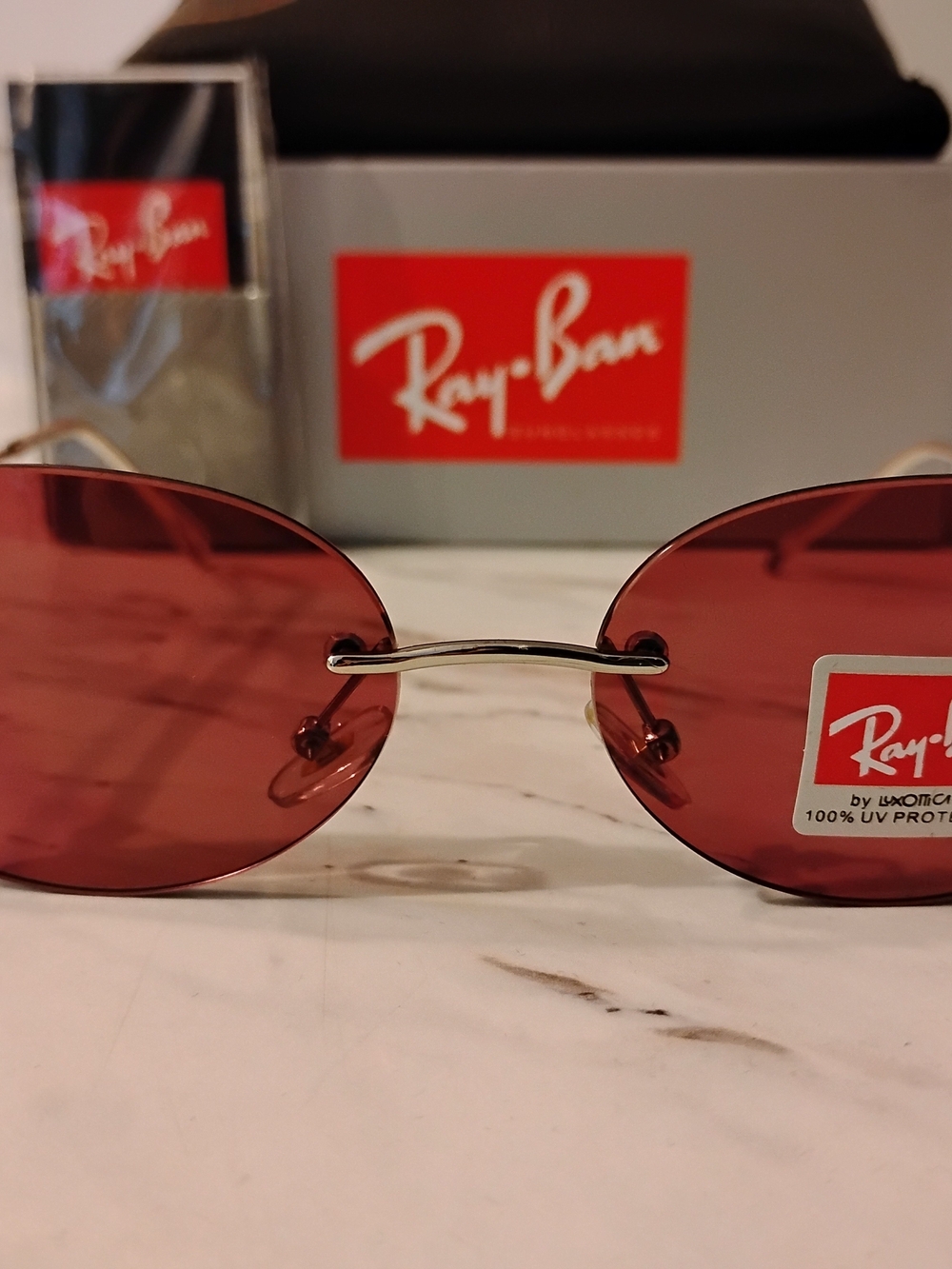 Ray-Ban Women's Rimless Oval Sunglasses - Pink Lenses